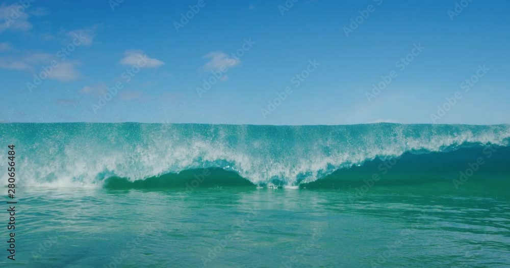 Big wave breaking and crashing with spray in slow motion, amazing ocean shorebreak Big wave breaking and crashing with spray in slow motion, amazing ocean shorebreak