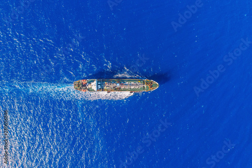 Oil chemical tanker sails blue sea. Aerial top view © Parilov