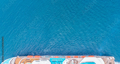 Cruise ship in blue sea. Aerial view photo. Copy space. © Parilov