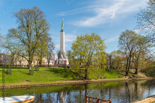 Bastion Gardens with view of the Freedom Monument in Riga, Latvia © EleSi