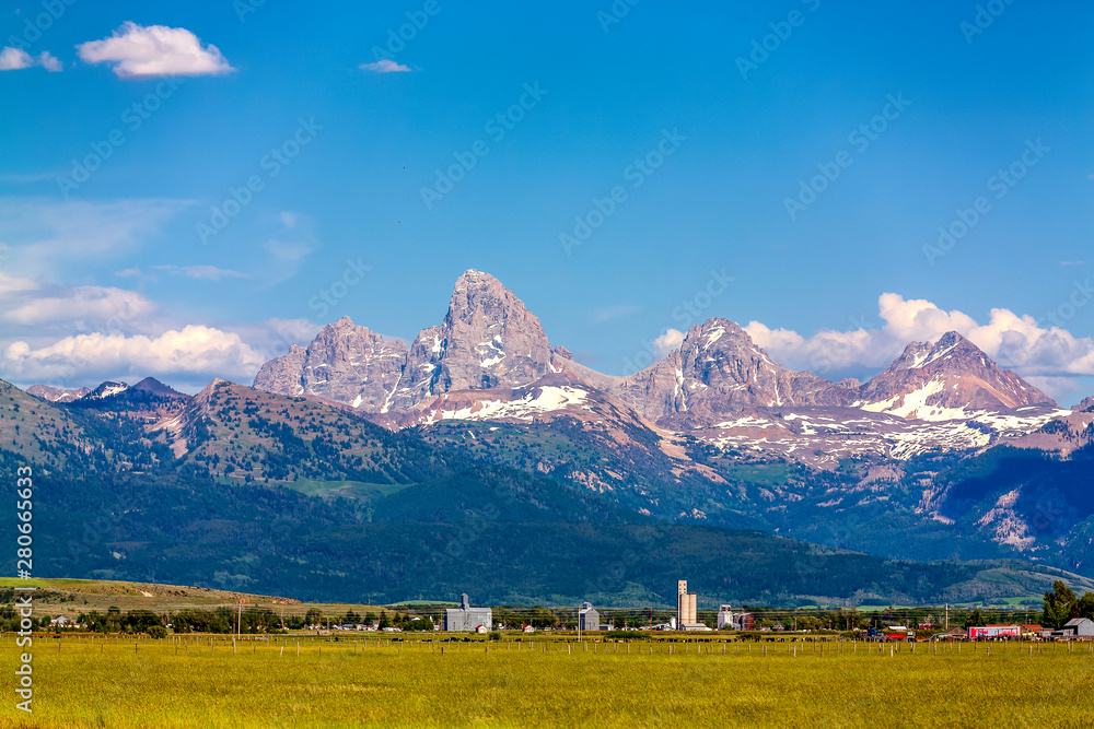 Mountains Tower Above Town, Plains