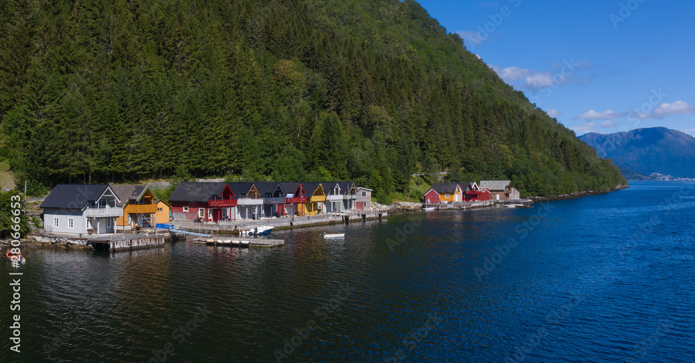 Fototapeta premium Vik, Norway - july, 2019: Vik port, Vik is a municipality in Sogn og Fjordane county. It is located on the southern shore of the Sognefjorden in the traditional district of Sogn. Aerial(drone) photo.