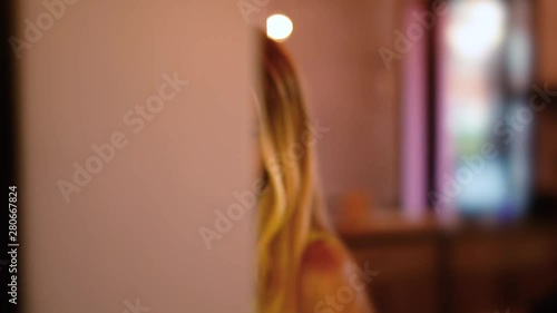 Beautiful girl drinks coffee with dessert in a cafe. advertising space
