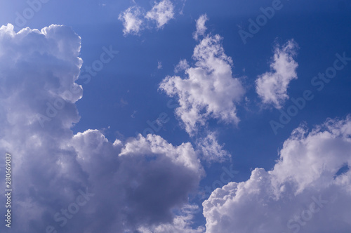 blue sky with white and gray clouds; cumulus. background; nature