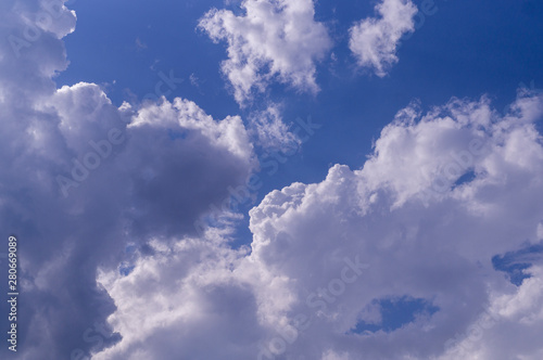 blue sky with white and gray clouds; cumulus. background; nature