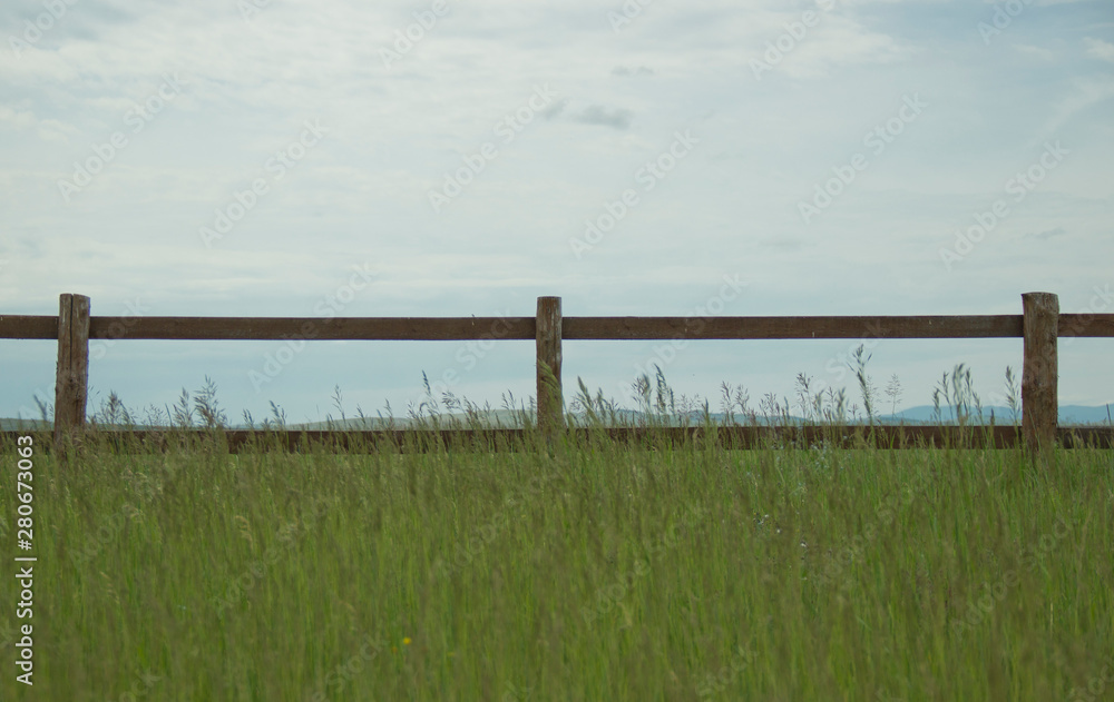 wooden fence in the field in daylight wooden fence in the field in daylight