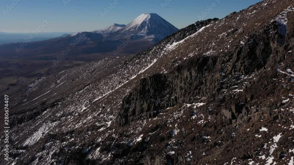 Mount Ngauruhoe aerial tilt up shot from the ground to the horizon, Reveal Shot Mount Ngauruhoe aerial tilt up shot from the ground to the horizon, Reveal Shot