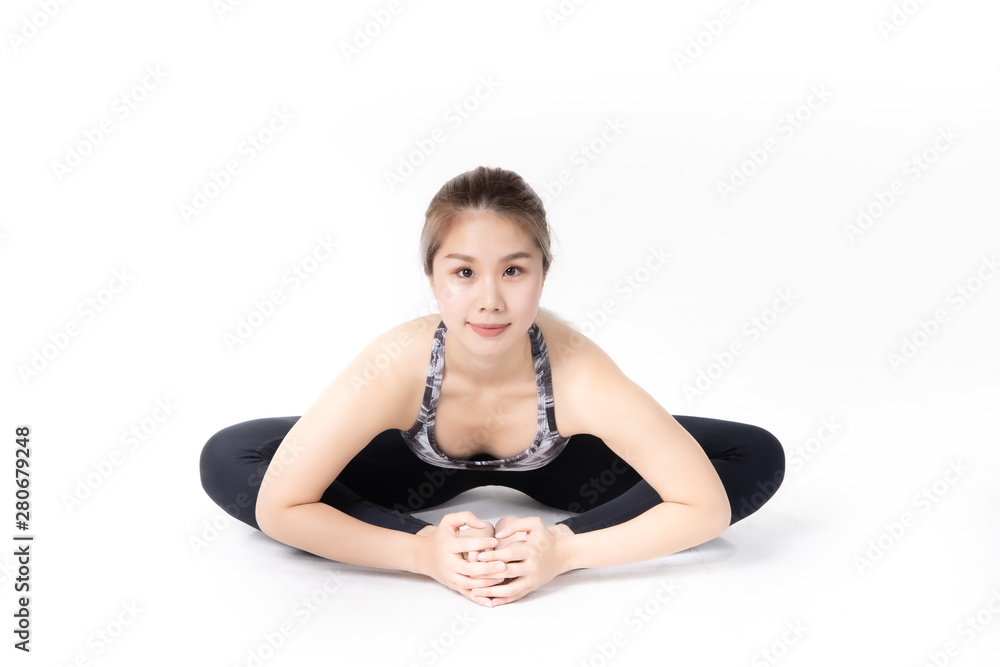Sporty Asian young woman doing yoga practice isolated on white background. Sporty Asian young woman doing yoga practice isolated on white background.
