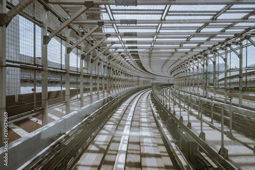 tunnel of monorail road view from front window of a moving train running