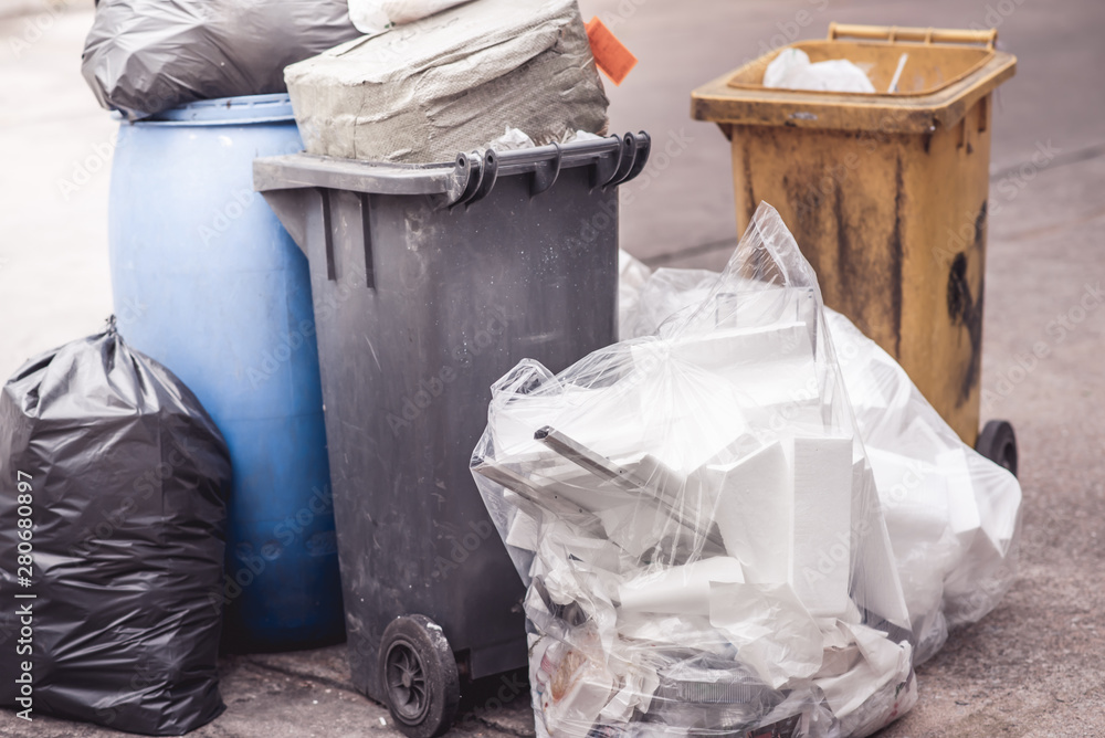 many garbage plastic bags black waste, pollution, lots junk dump, recycle green yellow bin many garbage plastic bags black waste, pollution, lots junk dump, recycle green yellow bin