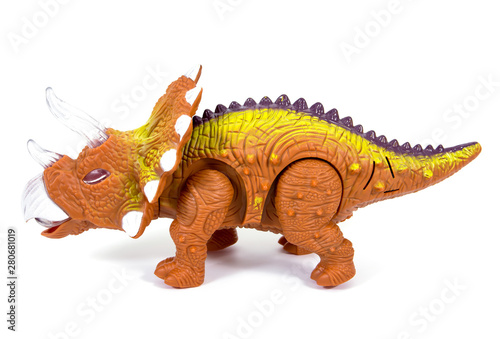 Side of dinosaur toy isolated on white background. Triceratops dinosaurs toy isolated