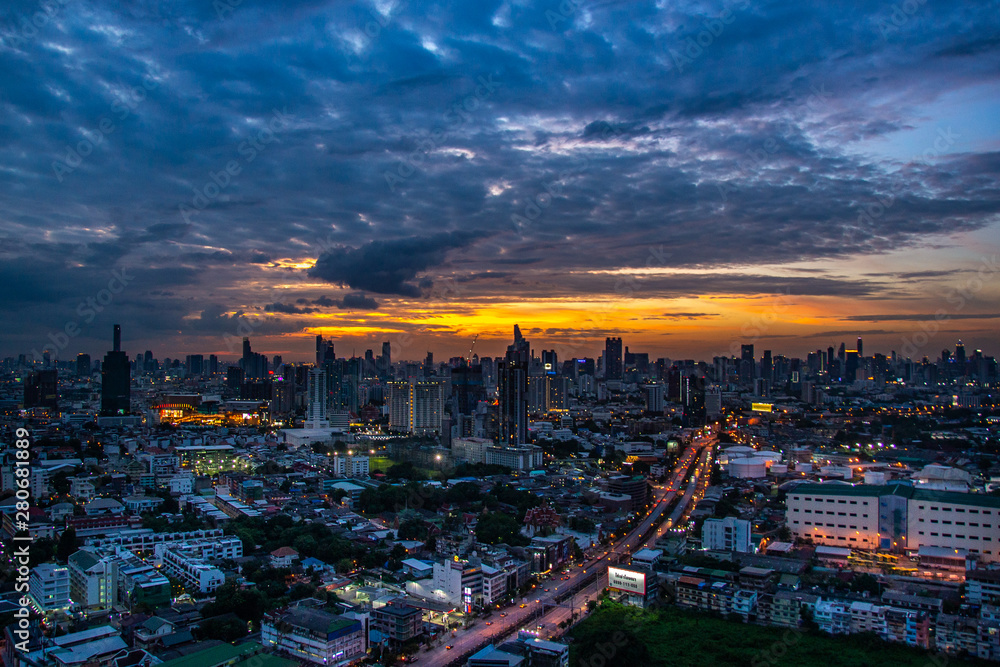 Sky view of Bangkok with skyscrapers in the business district in Bangkok in the during beautiful twilight give the city a modern style.