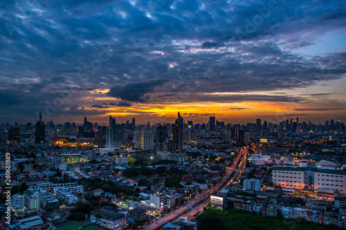 Sky view of Bangkok with skyscrapers in the business district in Bangkok in the during beautiful twilight give the city a modern style. © num