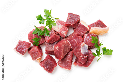 Raw chopped beef meat with spices. isolated on white background