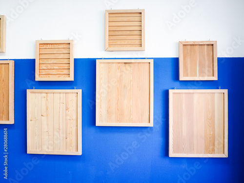 Fototapeta Naklejka Na Ścianę i Meble -  vintage wood frames on old blue wall