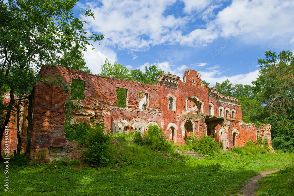 Sunny July day at the ruins of the ancient house of barons Vrangel. Torosovo, Leningrad region. Russia