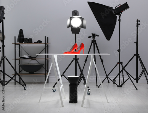 Professional photography equipment prepared for shooting stylish shoes in studio photo