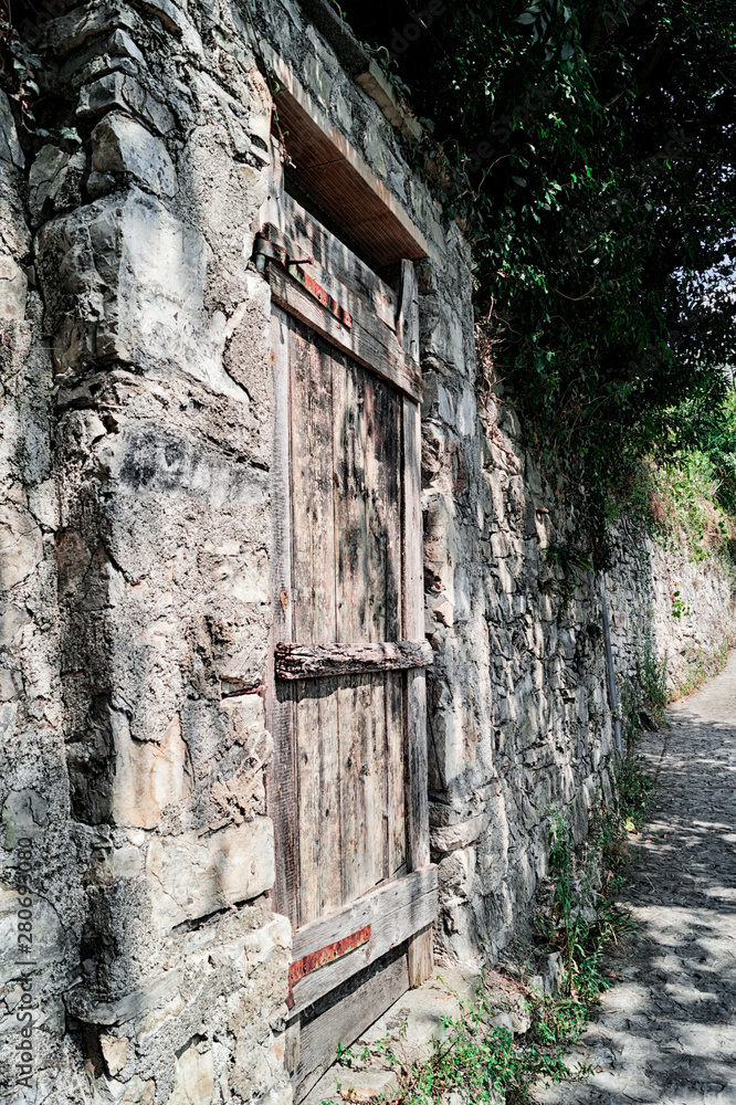 old wall and door in Gandra, Ticino, Switzerland 