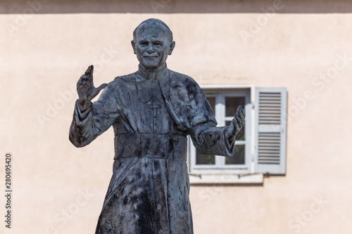 LYON / FRANCE - JULY 2015: Statue of John Paul II pope in front of Notre-Dame de Fourviere Basilica, Lyon, France photo