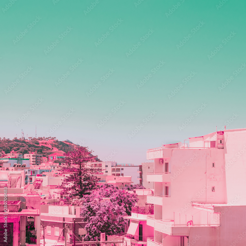 Fototapeta premium View of the seaside town. Tropical and exotic location. Infrared pink style.