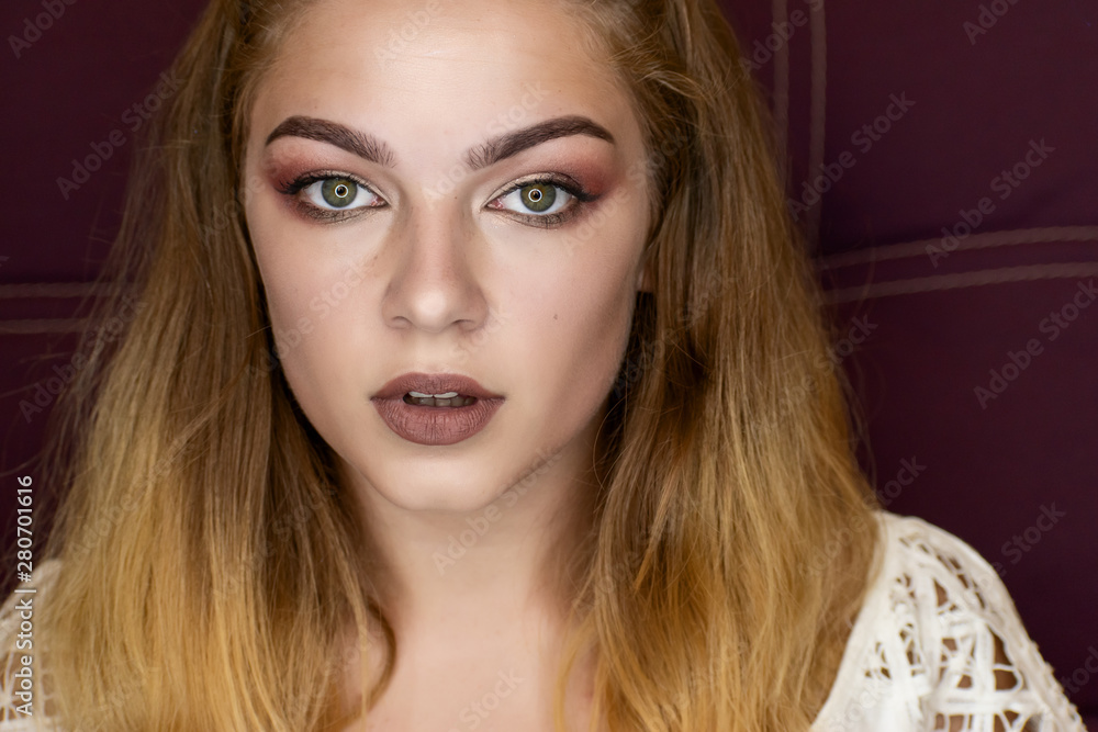 Naklejka premium Portrait of girl with professional make-up.