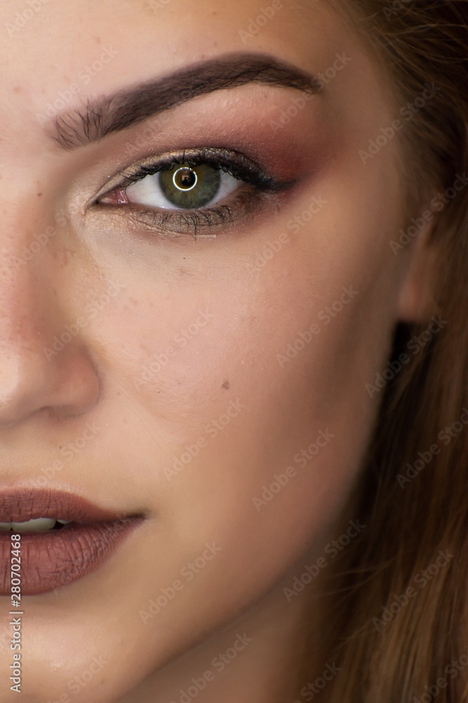 Fototapeta premium Portrait of girl with professional make-up.