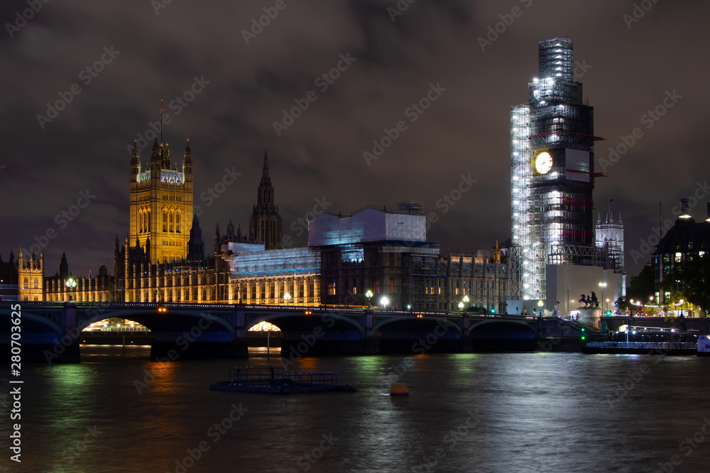 Big Ben under construction and westminster bridge in London Big Ben under construction and westminster bridge in London