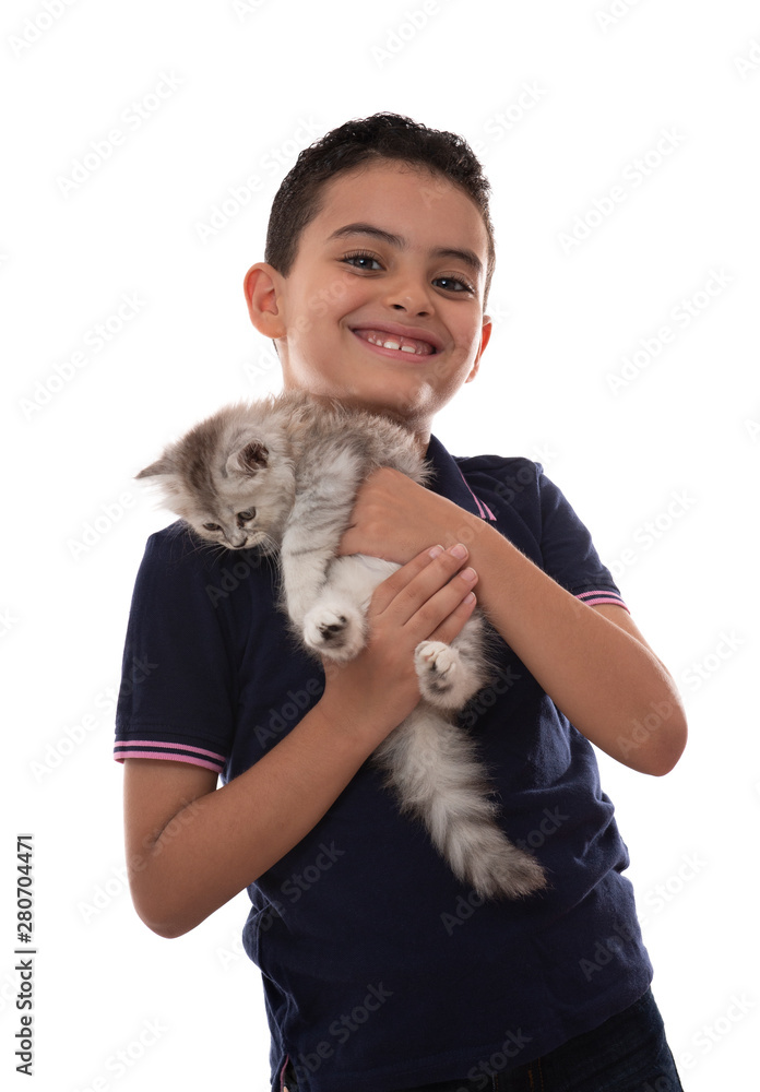 Obraz premium Happy Young Boy Smiling with Furry Kitten, Hugging His Pet, Isolated on White Background