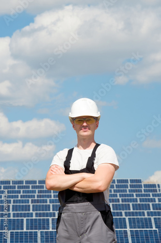 Solar panels engineer in white cask