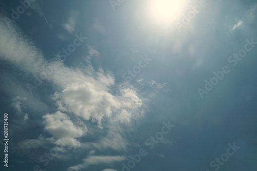 Beautiful nature of blue sky and clouds with the sun shining in the morning, sky background, cloudscape concept, Looking up