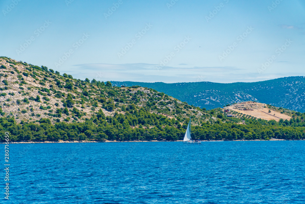 Lonely Yacht sailing on opened sea, Croatia