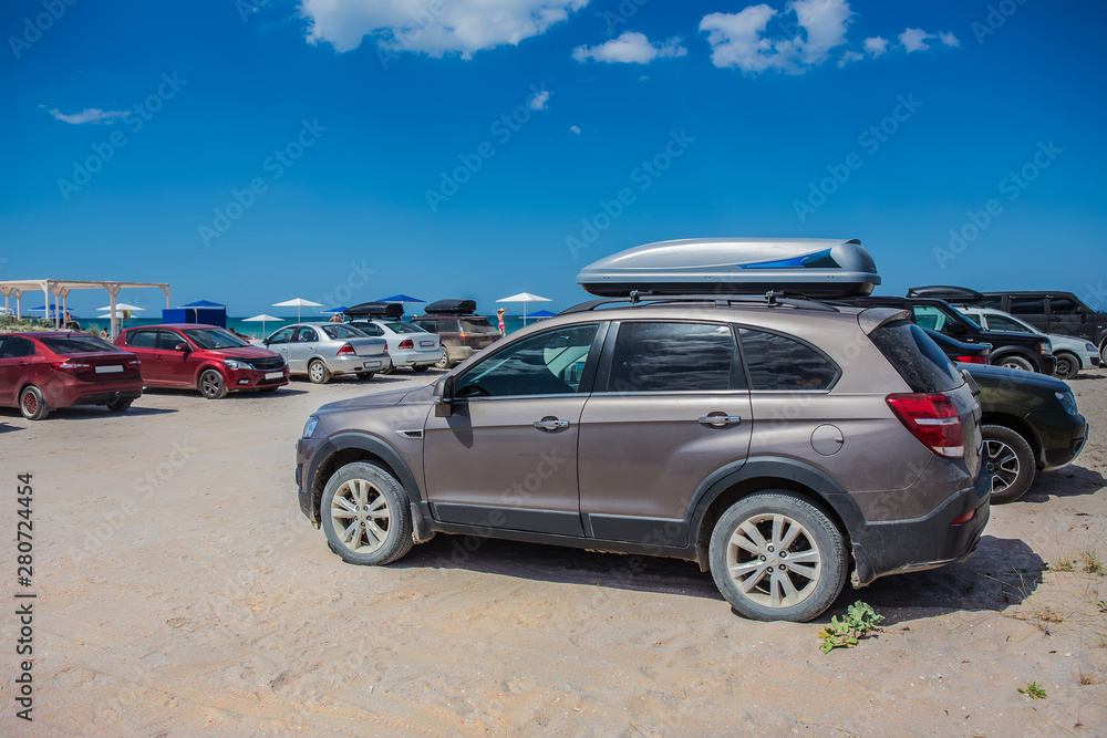 Cars on a sandy beach