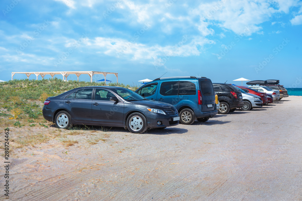 Cars on a sandy beach