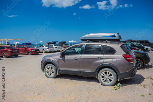 Cars on a sandy beach