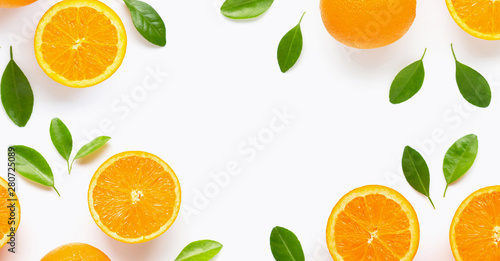 Frame made of fresh orange citrus fruit with leaves isolated on white background. Juicy and sweet.