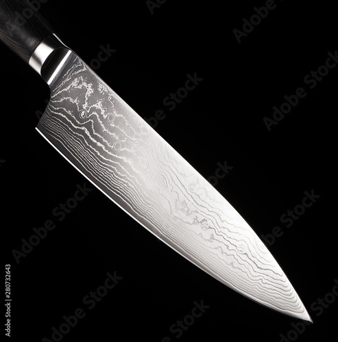 Steel kitchen knife with isolated on black background