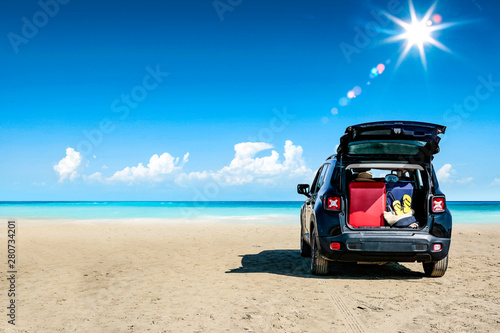 Black summer car and beach landscape 