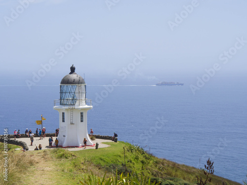 Passing ship at Cape Reinga Lighthouse, north edge of New Zealand