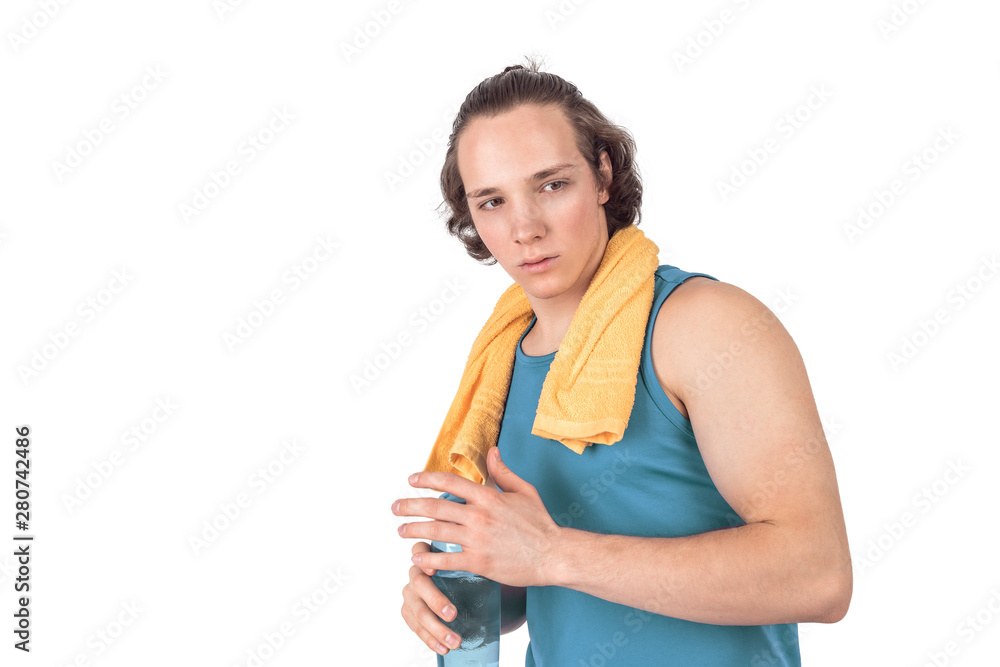 Handsome young man in sport shirt holding bottle of water. White background isolated Handsome young man in sport shirt holding bottle of water. White background isolated