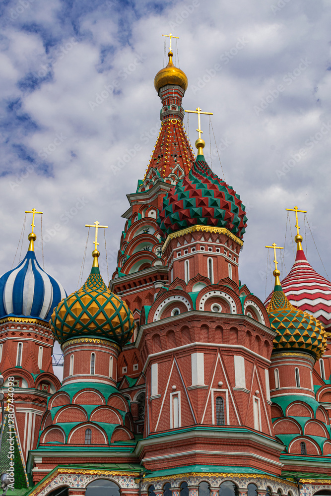Saint Basil´s colorful domes, with grey clouds background, Moscow, Russia