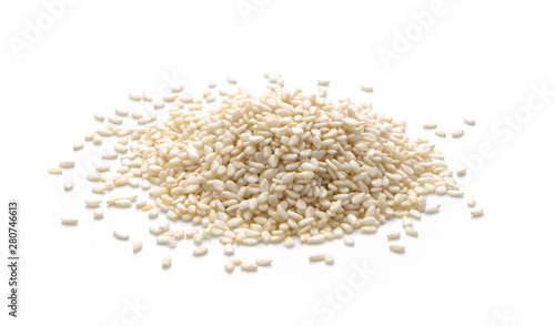 Pile sesame seeds isolated on white background