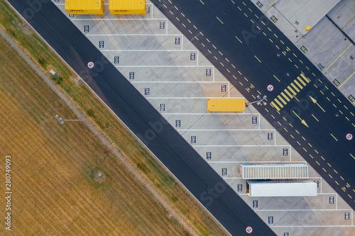 Aerial view of the distribution center, drone photography of the industrial logistic zone.