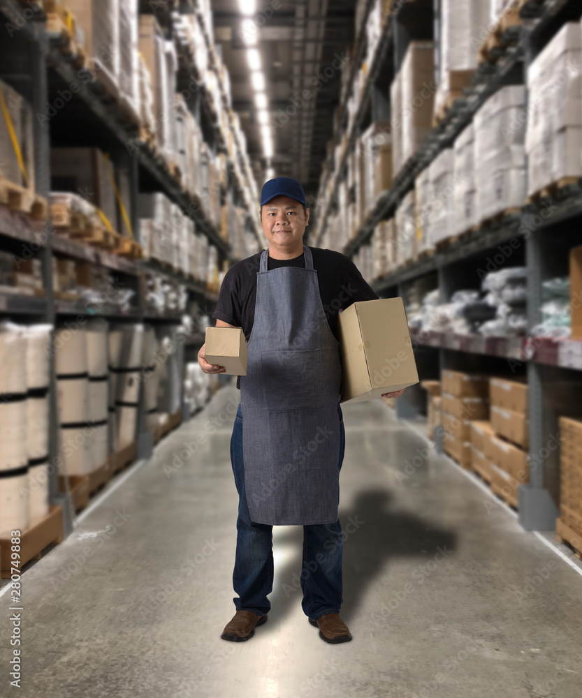 Worker holding parcel boxes Worker holding parcel boxes