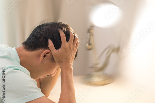 Brain diseases problem cause chronic severe headache migraine. Male adult look tired and stressed out depressed, having mental problem trouble, medical concept photo