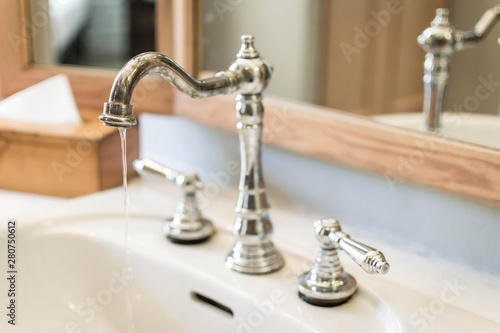 Close up of modern toilet sink with temperature adjust