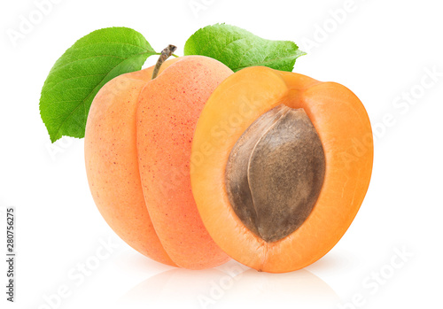 Isolated apricots. One and a half apricot with kernel isolated on white background with clipping path