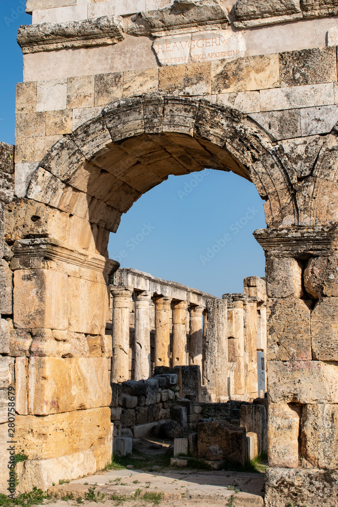 Turkey: the Frontinus Gate, the monumental entrance to the Roman city of Hierapolis (Holy City), the ancient city located on hot springs in classical Phrygia whose ruins are near Pamukkale  