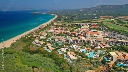 Aerial drone photo of famous sandy deep turquoise and blue exotic beach of Navarino in Messinia, Peloponnese, Greece © aerial-drone
