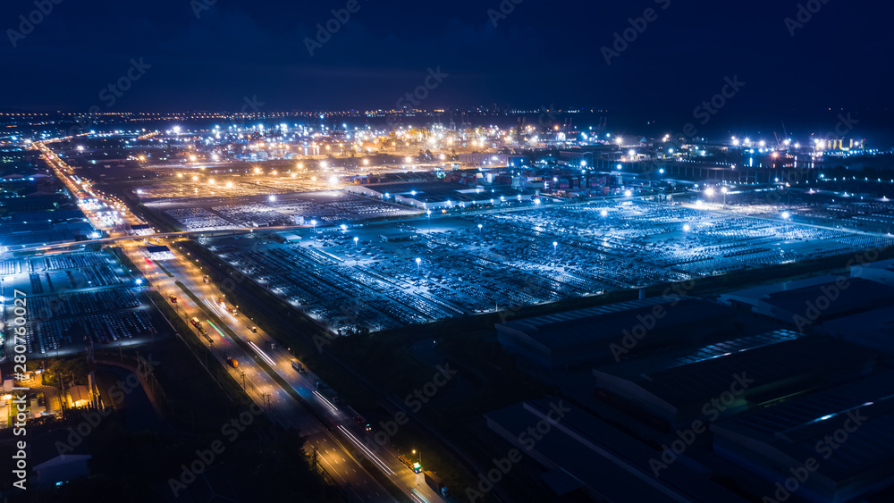 aerial view at night factory industry zone new cars line products parking and shipping port