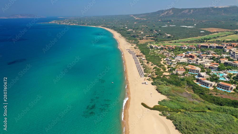 Aerial drone photo of famous sandy deep turquoise and blue exotic beach of Navarino in Messinia, Peloponnese, Greece